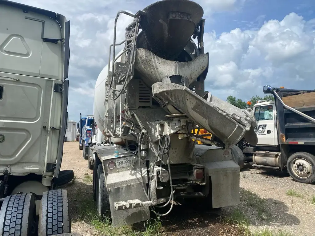 Damaged mixer drum and chute after a rollover recovery